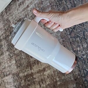 Reduce 40oz light pink with rose gold bottom tumbler cup!